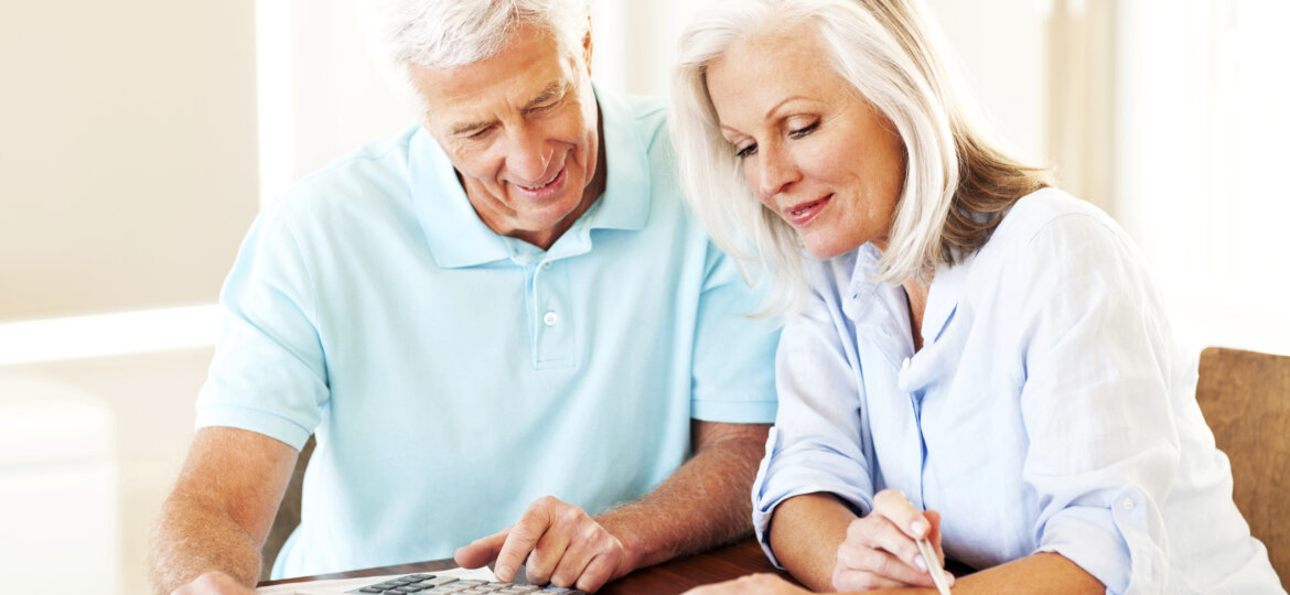 Older couple reviewing paperwork