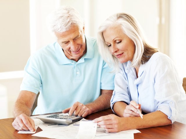 Older couple reviewing paperwork