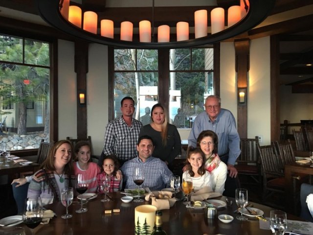 Family and agents sitting around a large table