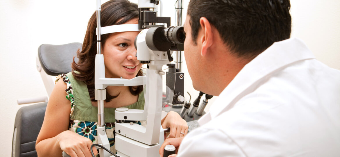 Optometrist giving an eye exam