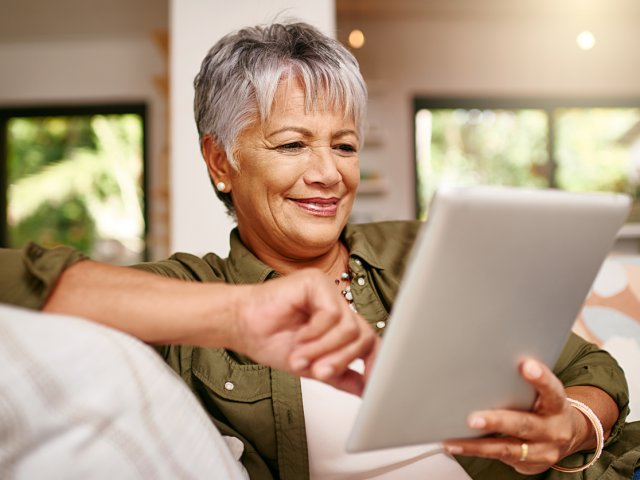 Senior woman on digital tablet