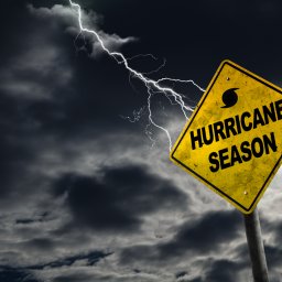 Yellow sign with storm behind