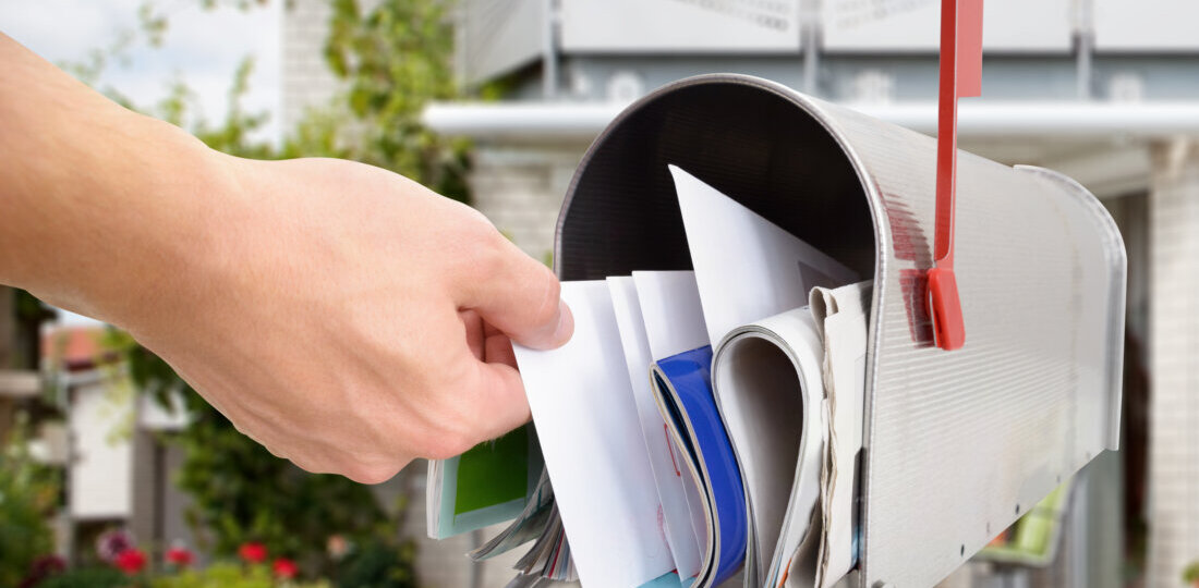 Hand in mailbox