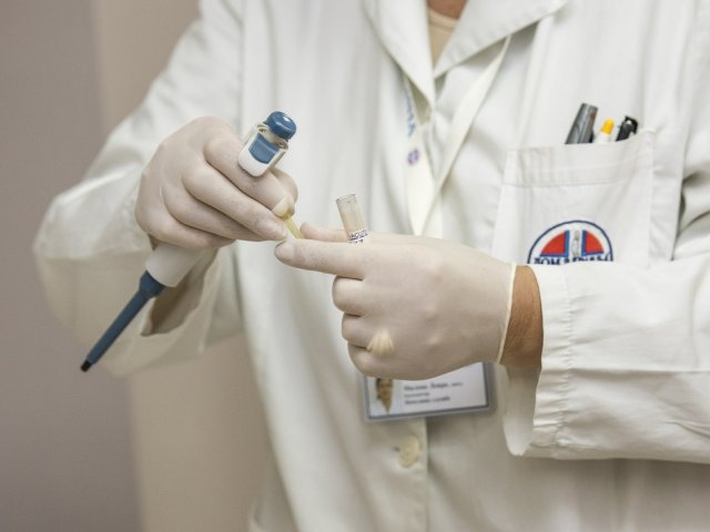 Doctor in white lab coat