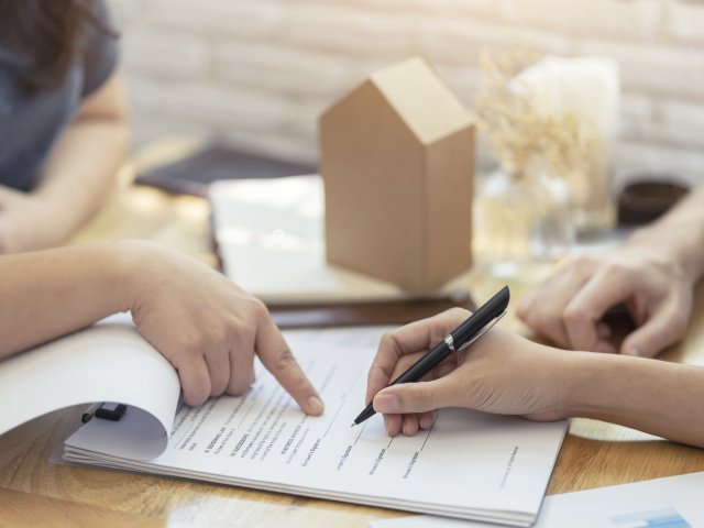 People reviewing paperwork