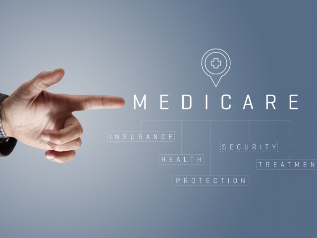 Hand pointing to Medicare