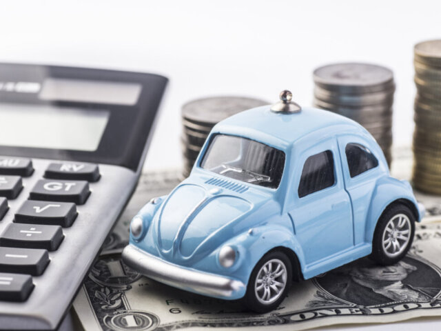 Blue toy car and money