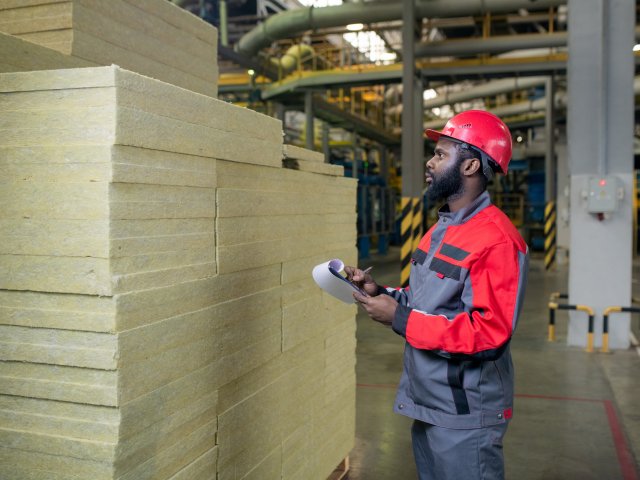 Commercial worker reviewing inventory