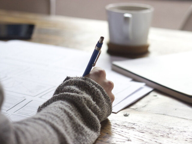 Woman with pen