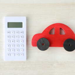 Calculator and red car toy