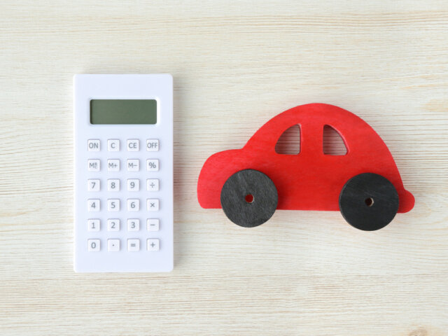 Calculator and red car toy