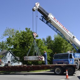 Crane loading truck