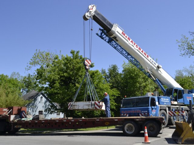 Crane loading truck