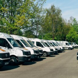 Line of white commercial vans