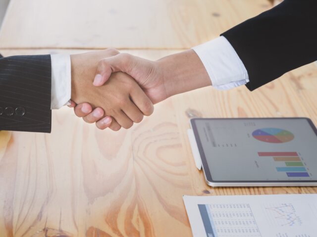 Business people shaking hands