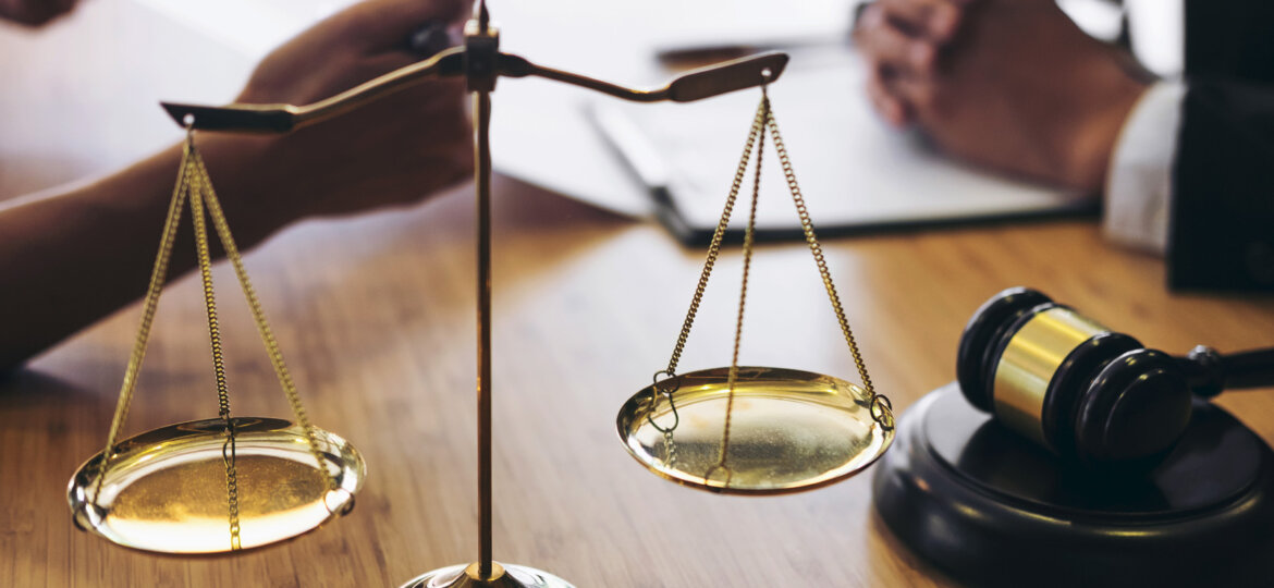 Scales and gavel on table