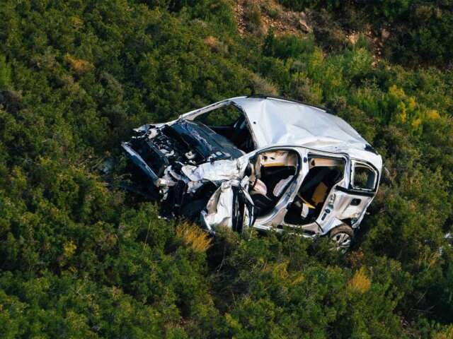 Car Wreck on Hillside